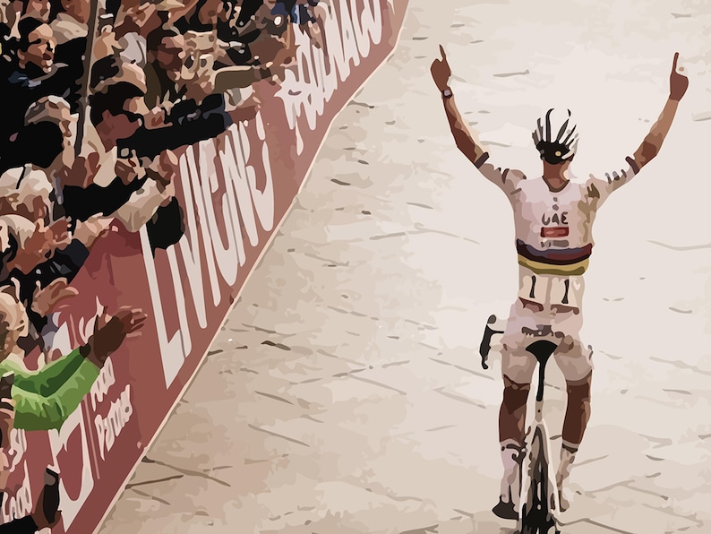 May include: A cyclist wearing a white and black jersey with the word "UAE" on the front, raises both arms in victory as they cross the finish line. The cyclist is wearing a white helmet and is riding a black bicycle.