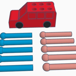 Peut inclure: Une voiture jouet rouge avec un jeu de chevilles en bois bleu et rose. La voiture a six trous sur le dessus et une fenêtre à l'avant. Les chevilles mesurent environ 25 cm de long.
