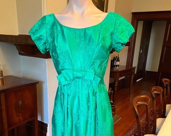 Striking 60s emerald green satin jacquard wiggle dress with bow by Emma Domb: small, extra small, xs, cocktail, evening, midi