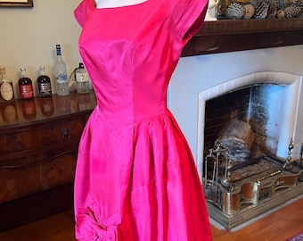 50s pink bow party dress: satin, xs, small, fit and flare, low back, sleeves, cap sleeves