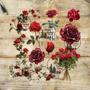 May include: An assortment of red rose stickers and decals on a wooden surface. The stickers include individual roses, rose bouquets, and rose vines. Some stickers have the text "Wicked Fantasy Designs" in a circular design.