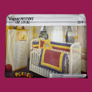 May include: A Vogue Patterns For Living 1514 sewing pattern envelope featuring a white cot with a yellow, blue, and red bedding set, a matching chest of drawers, and a toy train. The package includes instructions for measuring, cutting, and sewing.