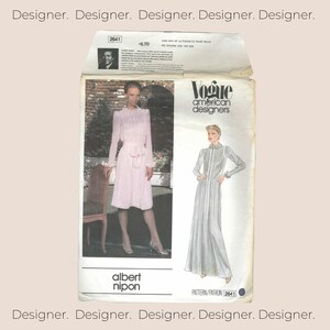 May include: A Vogue American Designers sewing pattern envelope for Albert Nipon design 2641. The white paper envelope features a photograph of a person wearing a long-sleeved, light-coloured dress with a ruffled collar and a sketch of the same dress.