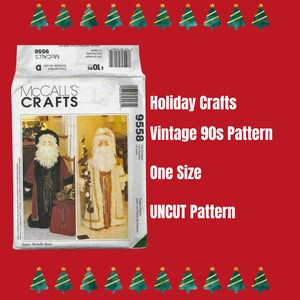 May include: Vintage McCall's Crafts pattern for making two Santa Claus figures. The pattern is uncut and includes instructions for making a standing Santa and a Santa holding a bag. The pattern is one size and is labelled "Holiday Crafts Vintage 90s Pattern".