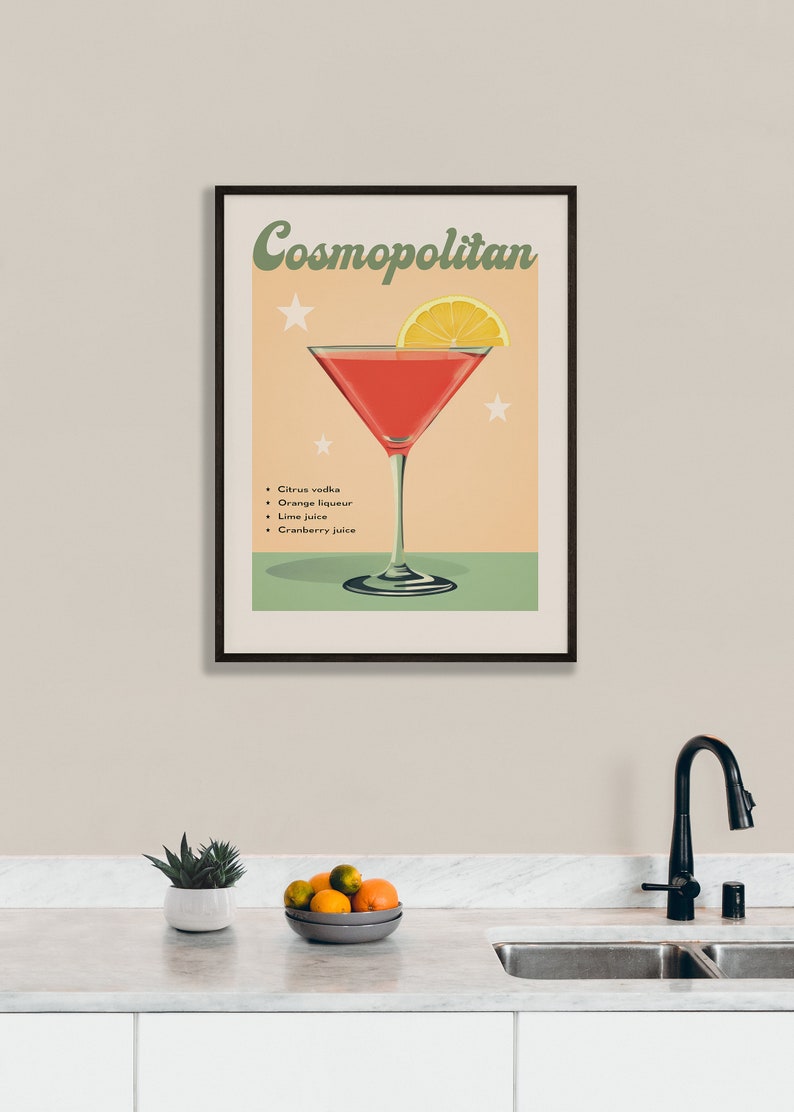 May include: A vintage-style poster with a cocktail recipe for a Cosmopolitan. The poster features a martini glass filled with a red cocktail and a lemon wedge garnish. The text "Cosmopolitan" is in a retro font and the ingredients are listed below: Citrus vodka, Orange liqueur, Lime juice, Cranberry juice.