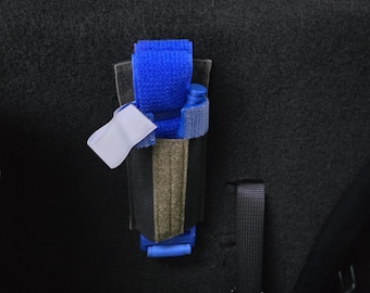 Vehicle Tourniquet Retention System (VTQRS)™