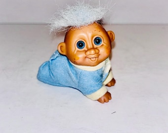 Rare vintage Russ crawling baby troll doll. Blue eyes, little over 2 inches