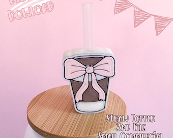 May include: A straw topper in the shape of a coffee cup with a pink bow. The straw topper is brown with a white border and a clear straw. The image includes the text "Digital Download".