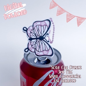 May include: A red soda can with a butterfly-shaped soda can opener attached. The butterfly is pink and white with a black outline. Text on the can reads "SODA CAN OPENER 3MF FILE SMALL COMMERCIAL USE INCLUDED".