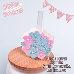 May include: A white ceramic mug with a black handle and the text "But First, Coffee" in a black, bold font. The mug is on a white surface.