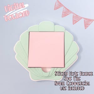 May include: A pastel green seashell-shaped sticky note holder with a pink square note pad. The holder has a white border and is on a light blue background. Text includes "Digital Download" and "Sticky Note Holder".
