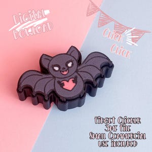 May include: A dark gray bat-shaped fidget clicker with a pink heart and white accents. The image includes the text "Digital Download" and "Click Click". The product is a 3MF file with small commercial use included.