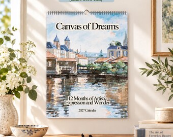 Puede incluir: Un calendario de pared 2027 titulado Canvas of Dreams con una pintura impresionista de una ciudad europea reflejada en el agua. La portada incluye el texto 12 Months of Artistic Expression and Wonder e indica el inicio de la semana en domingo.