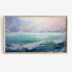 May include: A painting of a seascape with blue and green waves crashing against a white, cloudy sky. The painting is framed in a light wood frame.