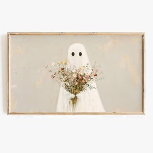 May include: A white ghost holding a bouquet of colourful wildflowers. The ghost has two black eyes and is depicted in a simple, minimalist style. The background is a light beige colour.