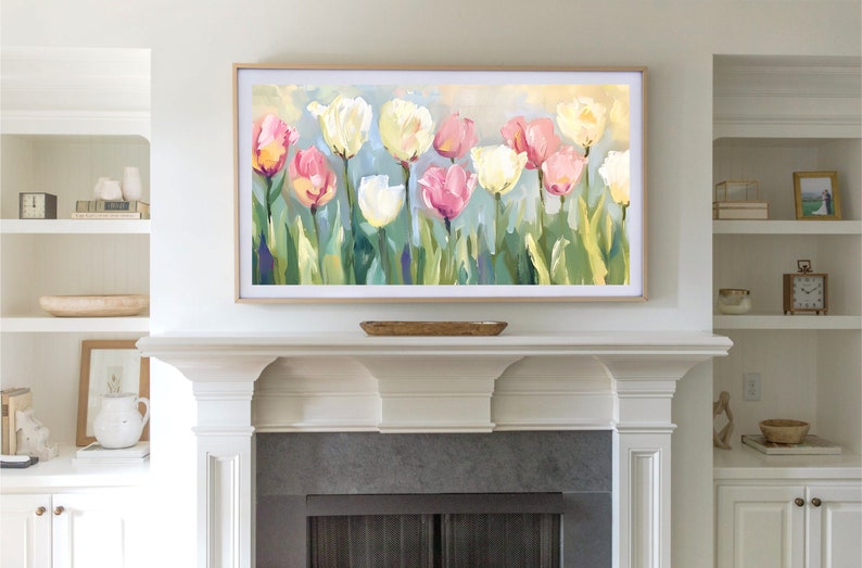 May include: A framed painting of a field of pink, white, and yellow tulips with green leaves and stems against a light blue and yellow background.