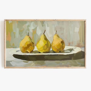 May include: A framed oil painting depicts three yellow pears on a white oval plate. The pears have brown stems and are set against a muted background of green, white, and yellow brushstrokes. The frame is a light wood color.