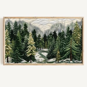 May include: A framed needlepoint artwork depicting a snowy forest scene with a variety of green and white trees. The trees are arranged in a dense, layered pattern, creating a sense of depth and perspective. The background is a soft, muted blue, suggesting a cloudy sky.