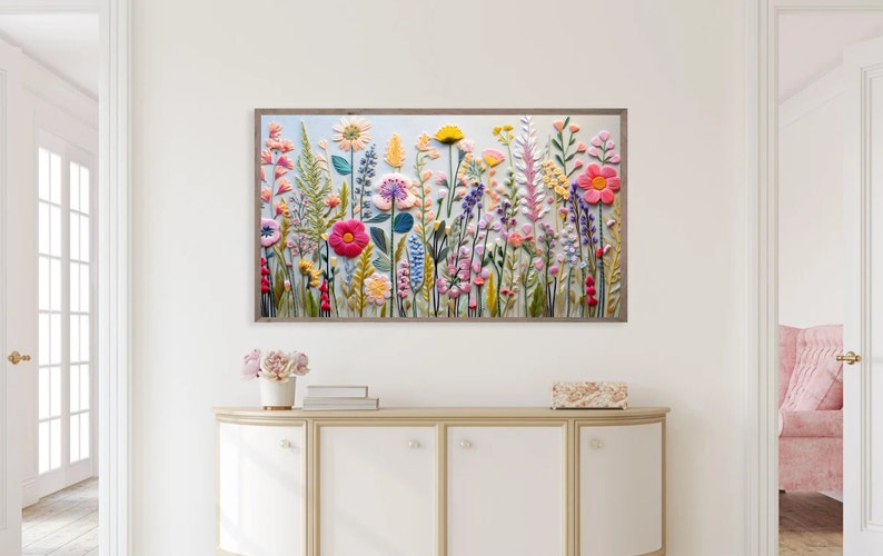 May include: A framed wall art print featuring a colourful floral design with pink, yellow, blue, and green flowers. The flowers are arranged in a vertical pattern and appear to be 3D.