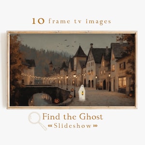 Pode incluir: Uma impressão de arte digital emoldurada com uma cena assustadora de Halloween. A obra de arte retrata uma vila pitoresca com edifícios iluminados, uma ponte e uma figura fantasmagórica. O texto "10 frame tv images" e "Find the Ghost « Slideshow »" são visíveis.
