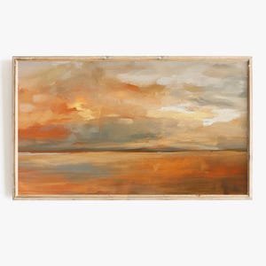May include: Abstract painting of a sunset over a body of water. The sky is a mix of orange, yellow, and gray, with clouds painted in a loose, gestural style. The water is a muted blue-gray, reflecting the colors of the sky.