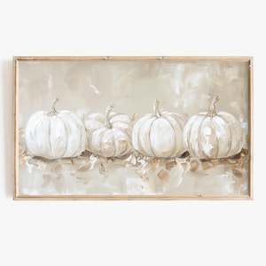 Puede incluir: Una pintura de cuatro calabazas blancas sobre un fondo beige. Las calabazas están dispuestas en una fila, con la calabaza más grande en el centro. La pintura tiene una paleta de colores suave y tenue.