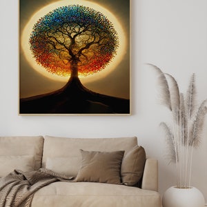 Puede incluir: Una impresi&oacute;n enmarcada de un &aacute;rbol colorido con un sol radiante detr&aacute;s. El &aacute;rbol est&aacute; silueteado sobre un fondo dorado. La impresi&oacute;n est&aacute; colgada en una pared blanca sobre un sof&aacute; beige.