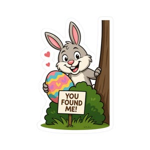 Lapin de Pâques tenant un You Found Me ! Signe