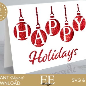 May include: A white card with red glitter ornaments spelling out "Happy Holidays".