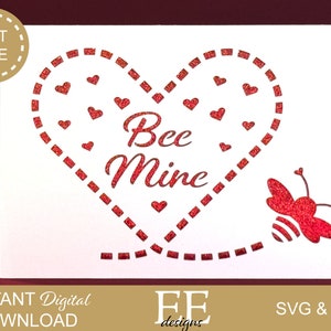 May include: A white card with a red glitter heart that says "Bee Mine" and a red glitter bee. The heart is outlined with a red dashed line and has small red hearts inside.