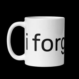 May include: White ceramic mug with black text that reads "i forgot".