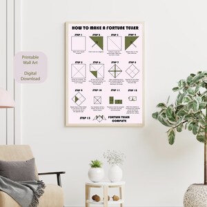 Puede incluir: Un p&oacute;ster de arte de pared imprimible con instrucciones sobre c&oacute;mo hacer un adivino. El p&oacute;ster tiene un esquema de color verde y blanco y muestra 13 pasos con ilustraciones.