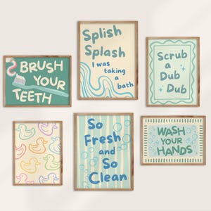 May include: A set of six rectangular wall art prints with wooden frames featuring bathroom-themed illustrations and text including Brush Your Teeth, Splish Splash I was taking a bath, Scrub a Dub Dub, So Fresh and So Clean, and Wash Your Hands.
