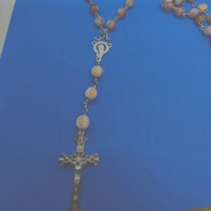 Handmade Catholic Rosary: Brown Swirl Beads, Virgin Mary Medal