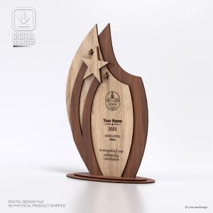 May include: A wooden Excellence Award trophy with a shield design. The trophy features a light wood center with the text "Your Name", "2023", and "Excellence Award". Two stars are cut out of the light wood. The trophy is framed by dark wood.