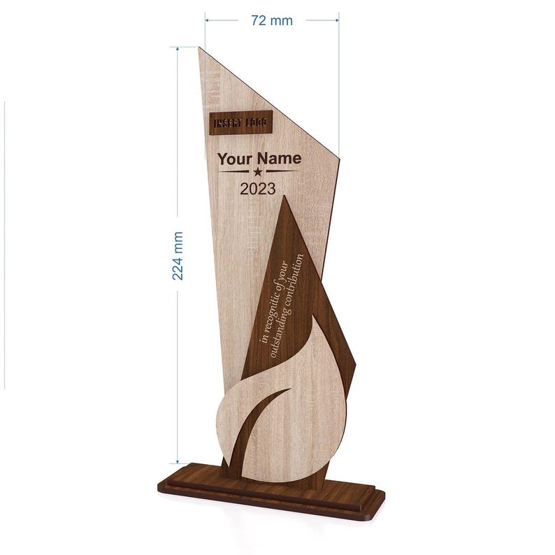 May include: A wooden trophy with a light wood grain finish, featuring a dark wood accent and base. The trophy is 224 mm tall and 72 mm wide. Text includes "Your Name", "2023", and "in recognition of your outstanding contribution."