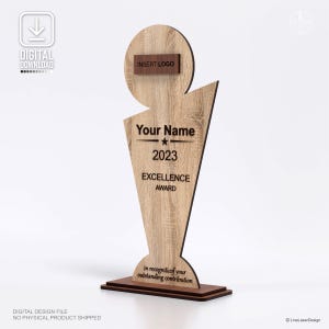 May include: A wooden Excellence Award with a light brown wood grain finish. The award features the text "Your Name", "2023", and "EXCELLENCE AWARD". It includes a space for a logo and the phrase "in recognition of your outstanding contribution".