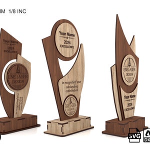 May include: Three wooden award plaques with a brown and light wood finish. The plaques feature a circle with the text "Line Laser Design" and a space for a name, year, and the word "Excellence". The plaques are 3-4-5 mm thick and 1/8 inch thick. The image includes the text "Thickness 3-4-5 mm 1/8 inc" and "Digital Download".