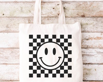 Bolsa de lona con cara sonriente a cuadros: una moderna bolsa de compras reutilizable