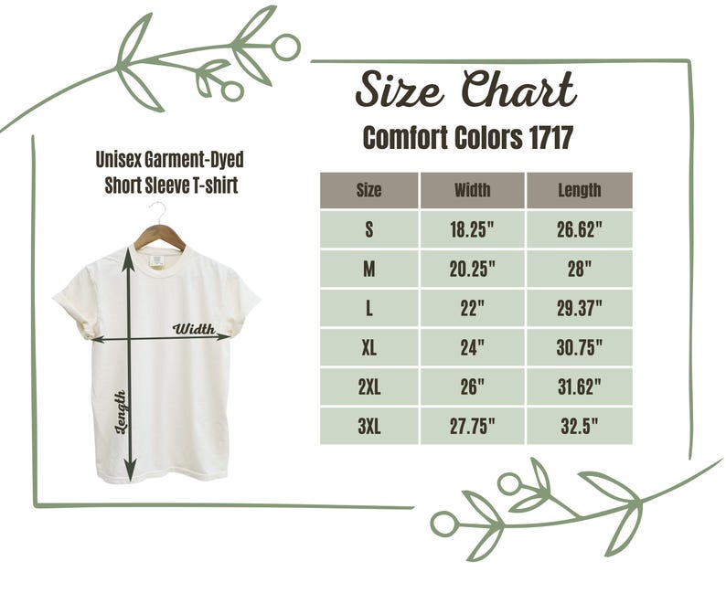 Op de afbeelding: Cr&egrave;mekleurig unisex garment-dyed T-shirt met korte mouwen op een hanger. Een maattabel toont afmetingen in inches voor maten S tot 3XL, inclusief breedte en lengte. De tabel is gelabeld "Comfort Colors 1717".