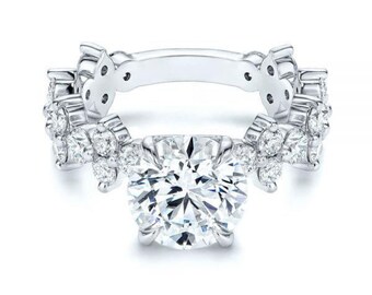 Sparkle this Mother's Day with our 1.00 CT Moissanite Diamond Ring, Round Cut, 6.5mm, 0.60 TCW, D Color, SI Clarity