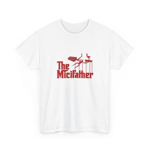 May include: White t-shirt with a red graphic that reads "The Micifather." The graphic features a parody of the Godfather logo, with a cat-themed design. The shirt is made of a soft, comfortable material.