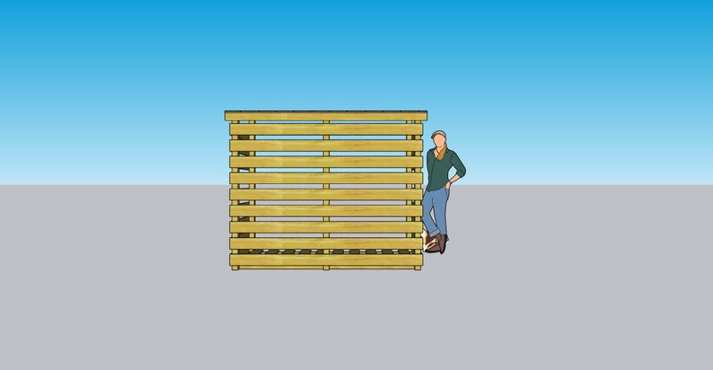 Puede incluir: Una valla de palets de madera hecha de palets de madera apilados. La valla tiene aproximadamente 1,8 metros de altura y est&aacute; hecha de madera natural.