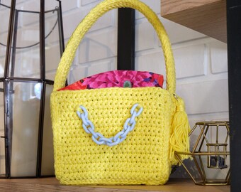 Small bright yellow handbag with decorative chain in large sky blue mesh and pompom on the side Handmade in France