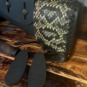 Eastern Diamondback rattlesnake covered leather gun butt stock , 100% 1/8" cow hide and comes with 2 butt stock pads