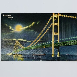 Most Mackinac nocą, Michigan, zabytkowa pocztówka, sierpień 1959 r.