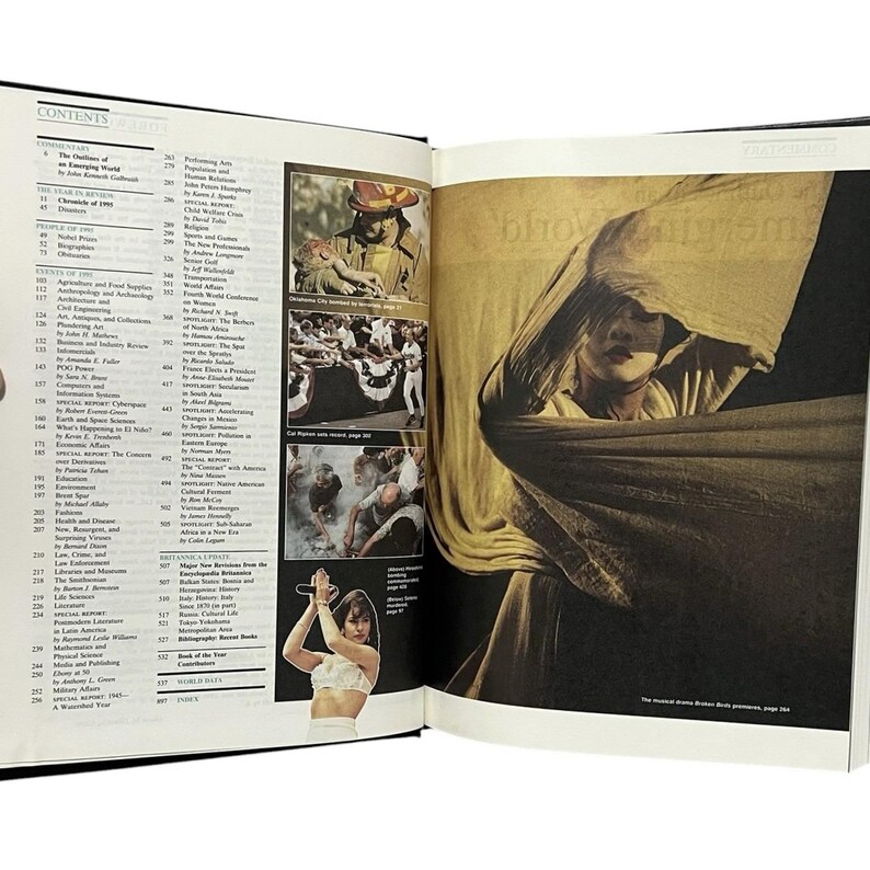 May include: An open book with a black cover, showing a contents page and various images. One image features a person partly hidden by fabric. Other images include a firefighter, a crowd, and a woman with a microphone.