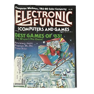 Peut inclure: Une revue vintage de décembre 1983 d'Electronic Fun with Computers and Games. La couverture présente le Père Noël dans un traîneau avec le texte "Best Games of '83!" et des critiques de Joust, Popeye, Mr. Do et Time Pilot. Le magazine est au prix de 2,50 $.