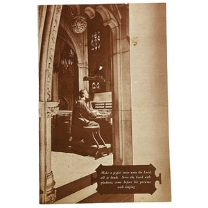 May include: A black and white photo of a man playing a pipe organ in a church. The text in the image reads: "Make a joyful noise unto the Lord, all ye lands. Serve the Lord with gladness, come before his presence with singing."