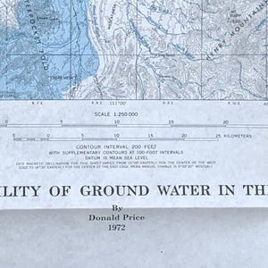 May include: A black and white topographic map with blue contour lines. The map shows the "Lity of Ground Water in the" area. The map is titled "By Donald Price 1972".